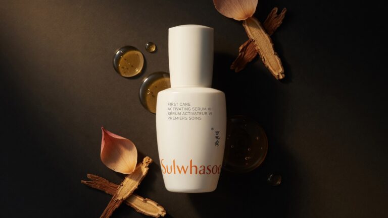 Sulwhasoo First Care Activating Serum amber bottle on luxury dark background