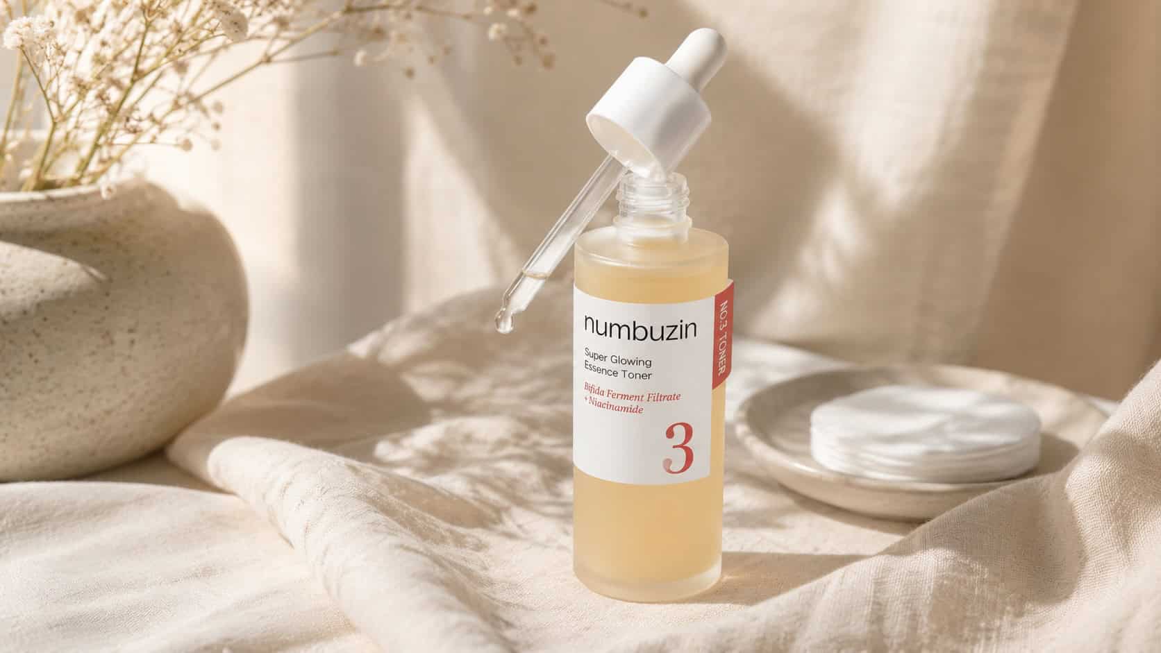 Numbuzin No.3 Toner bottle on linen background with dropper