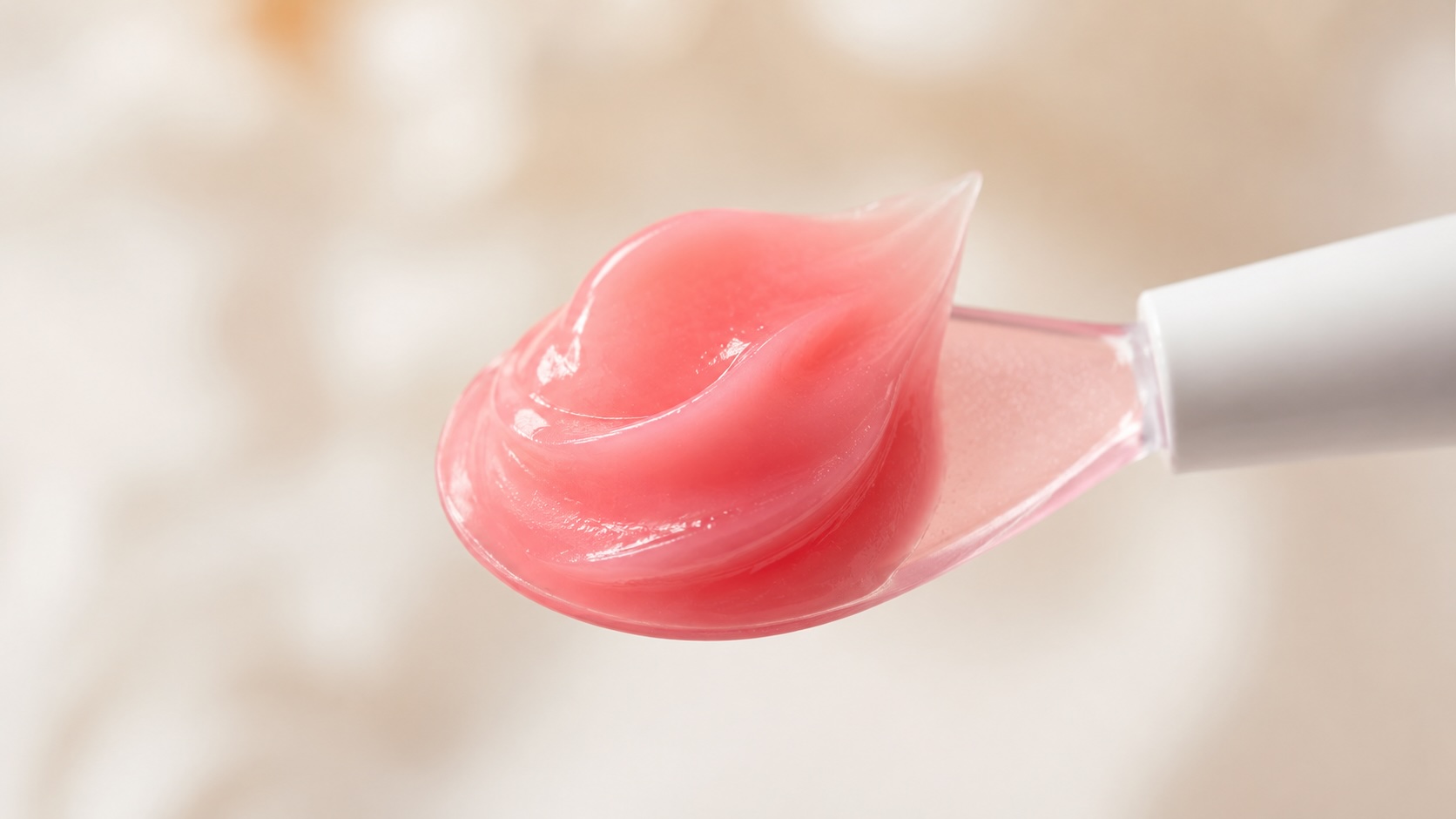 Laneige Lip Sleeping Mask jelly balm texture on spatula showing pink rich consistency