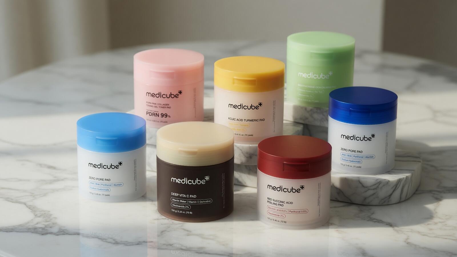 Medicube Zero Pore Pad lineup — all 7 color variants on white background