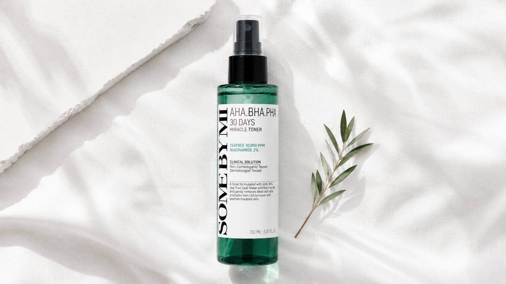 Some By Mi AHA-BHA-PHA 30 Days Miracle Toner pink bottle on clean white surface with minimalist Korean beauty styling