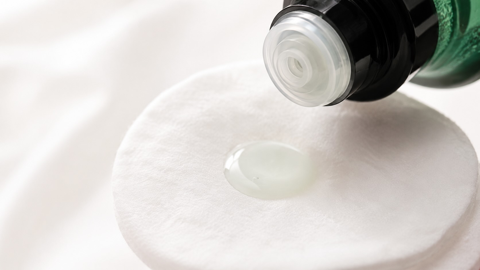 Some By Mi 30 Days Miracle Toner watery texture on cotton pad showing clear pale liquid exfoliating toner