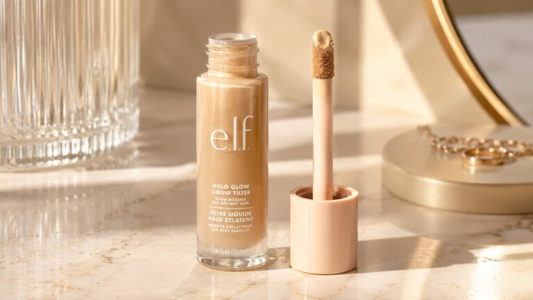 e.l.f. Halo Glow Liquid Filter dropper bottle on cream marble background