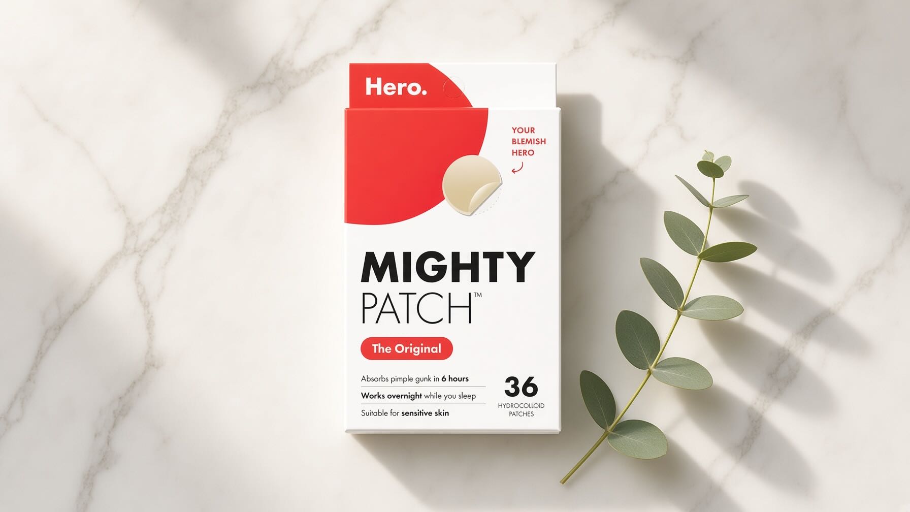 Hero Cosmetics Mighty Patch Original packaging on cream marble with minimal skincare editorial styling