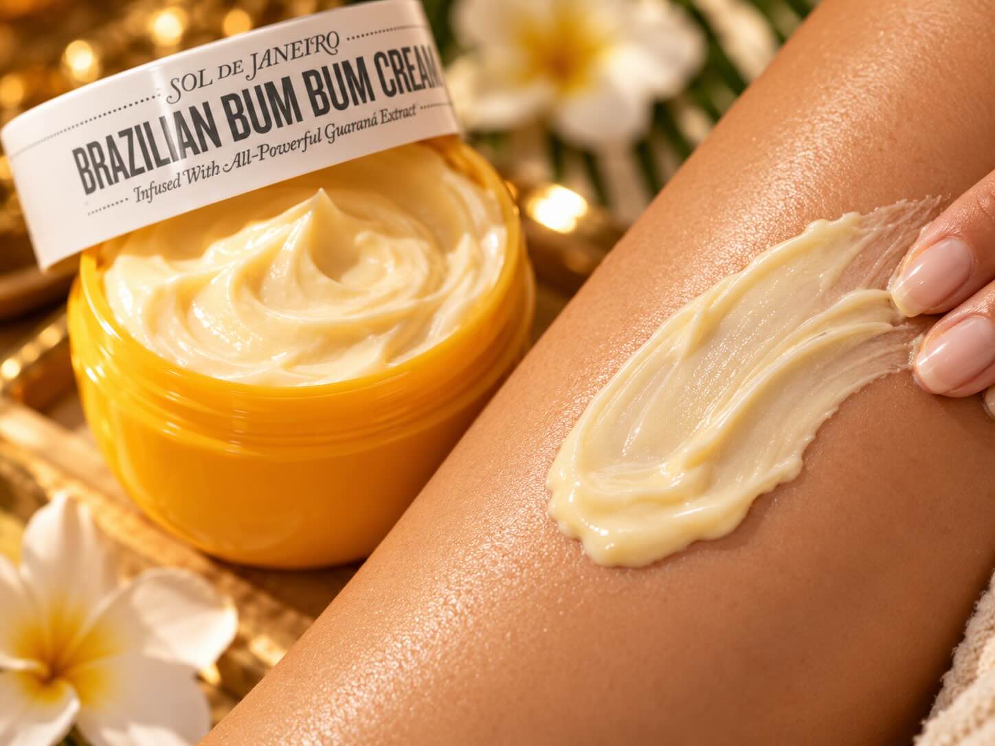 Sol de Janeiro Bum Bum Cream thick rich texture swatched on skin showing the golden cream consistency and quick-absorbing formula